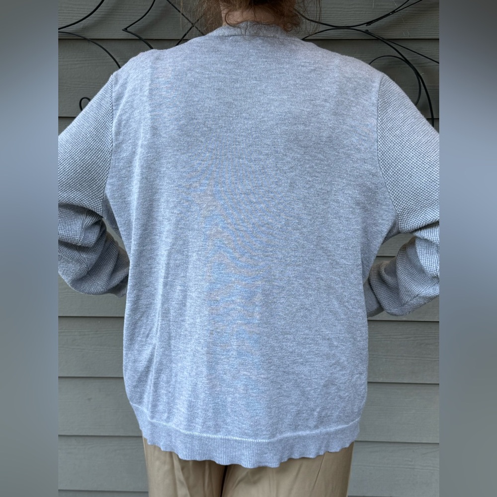 This gray sweater is great for a chilly day to keep you cozy!